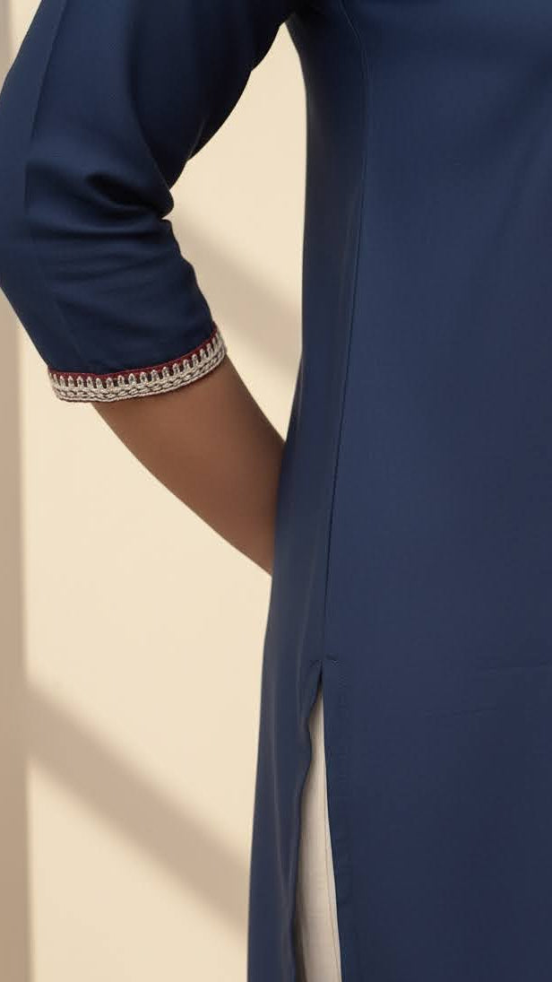 Navy blue dress with white trim on a beige background
